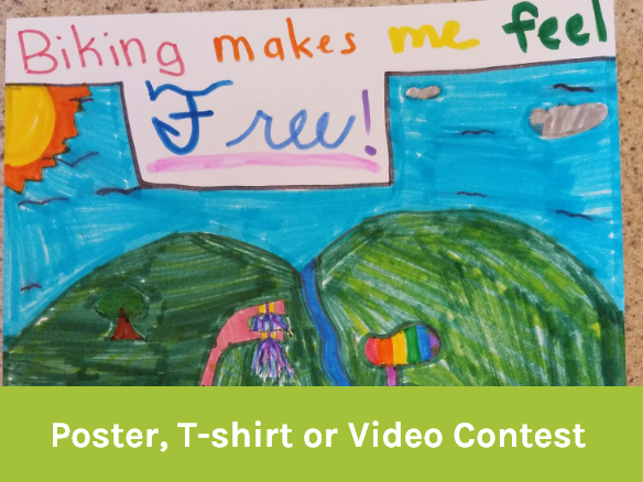 Image of a poster drawn by a child of the sky with birds, clouds, the sun, and hills that says "Biking makes me feel free!"
